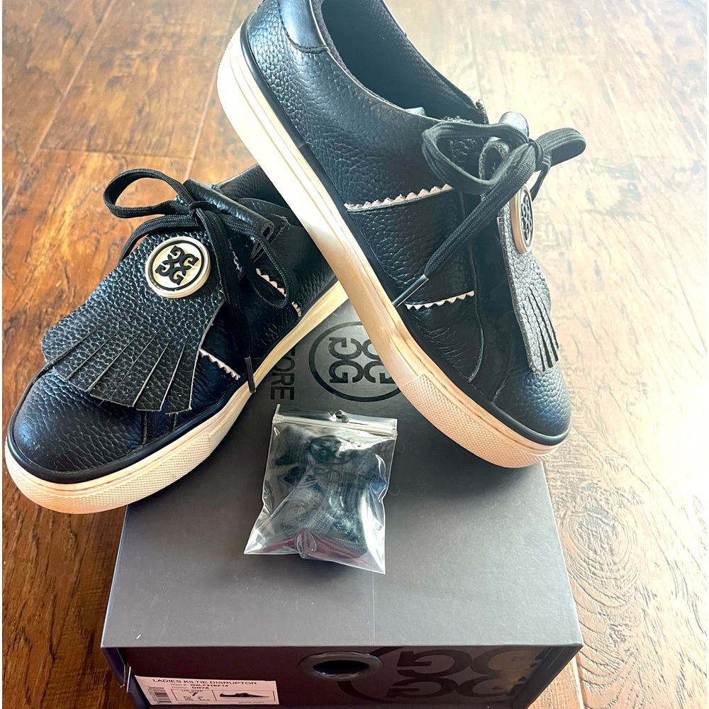 G/FORE black and white kiltie golf shoes